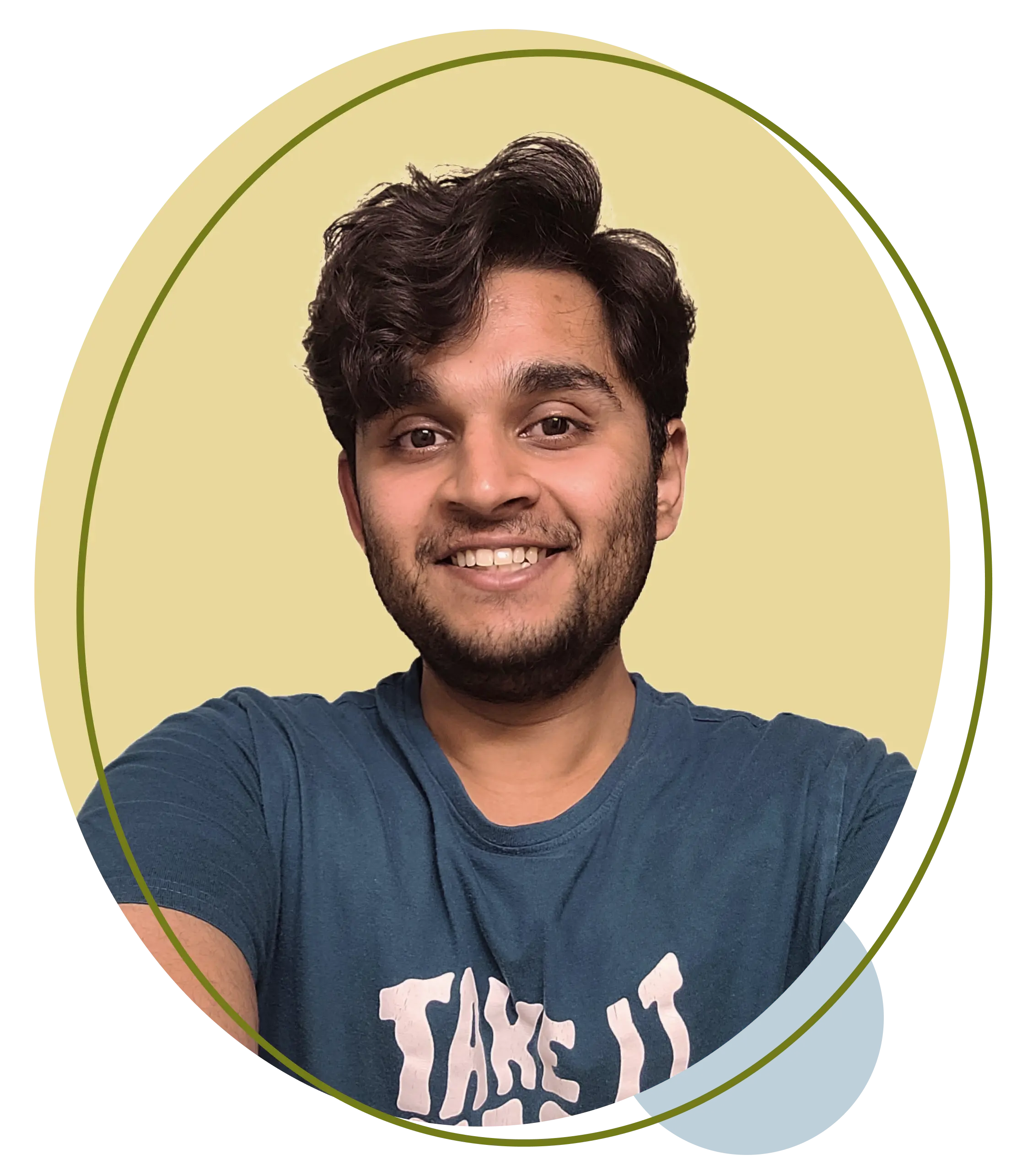 Atharva's photo inside 2 ellipses wearing a orange full t-shirt